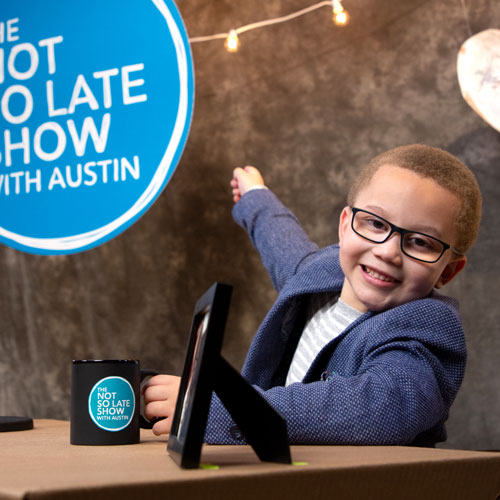 Austin with Sign