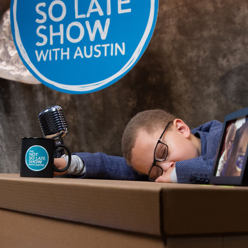 Austin Sleeping with Sign